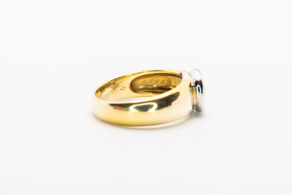Złoty pierścionek z brylantem 0,8ct