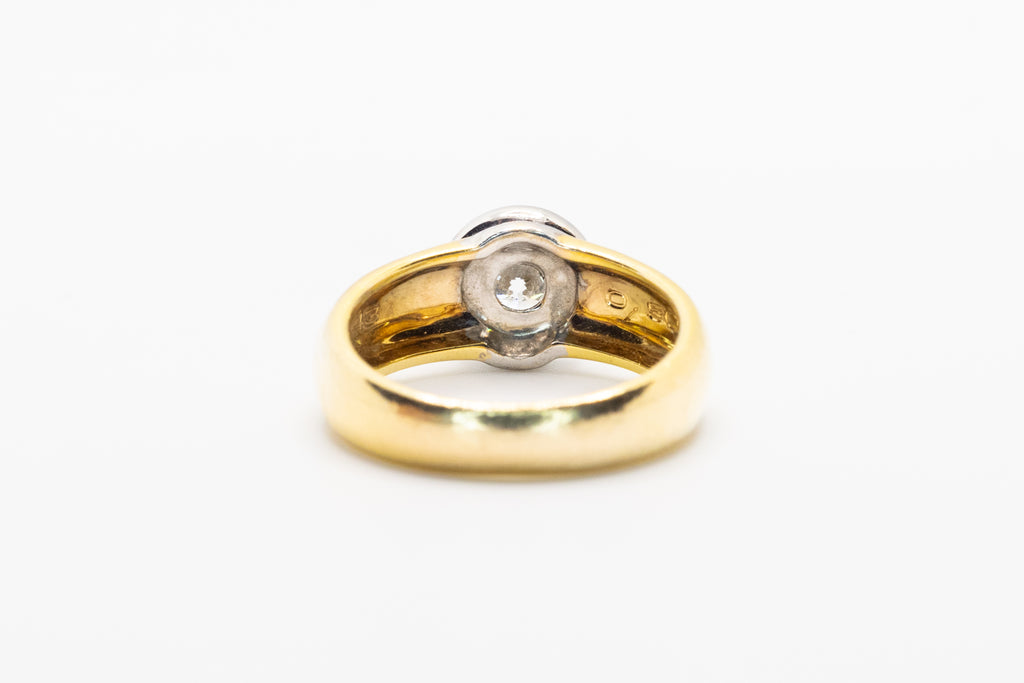 Złoty pierścionek z brylantem 0,8ct